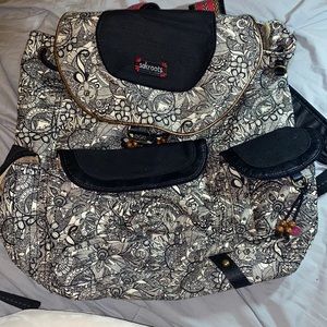Sakroot black and white snap backpack